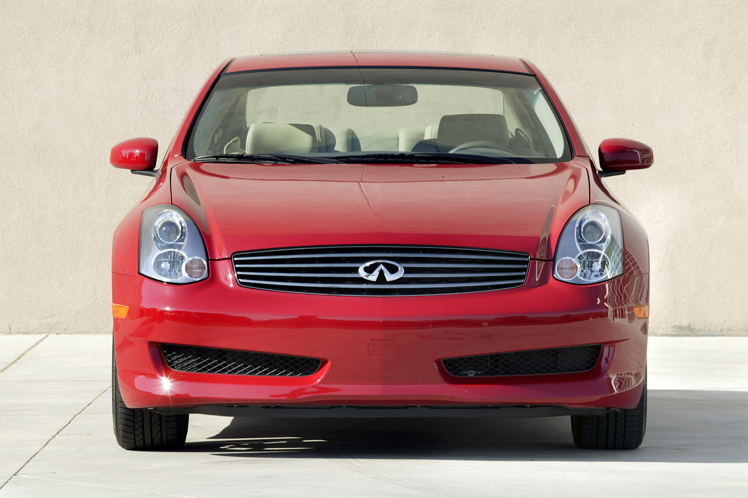 A red 2006 Infiniti G35 Coupe